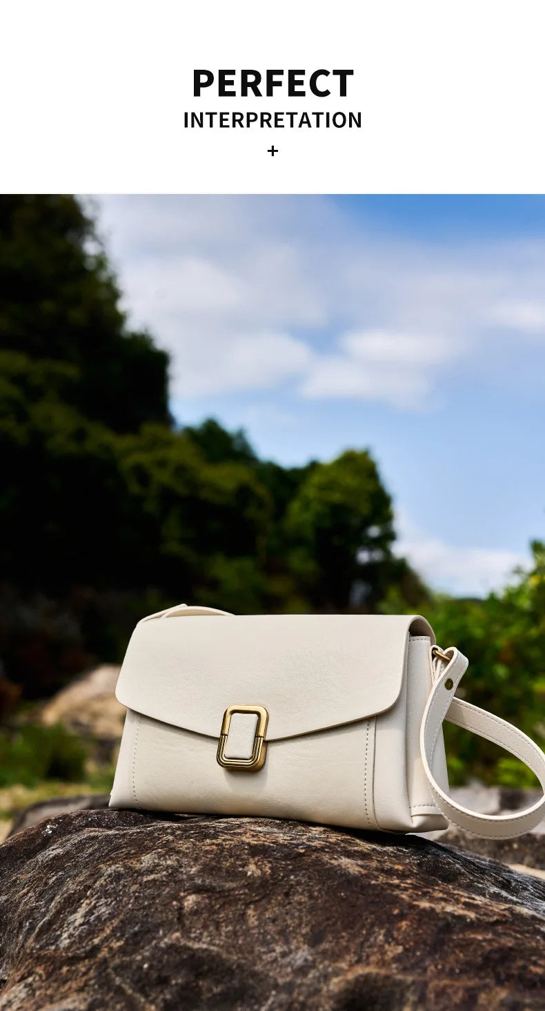 Bolsa feminina portátil de couro genuíno 2025, novo nicho de alta qualidade, bolsa de ombro crossbody, bolsa de viagem feminina com duas alças