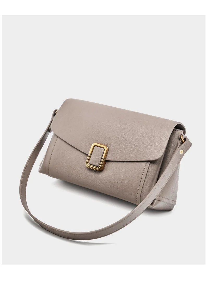 Bolsa feminina portátil de couro genuíno 2025, novo nicho de alta qualidade, bolsa de ombro crossbody, bolsa de viagem feminina com duas alças