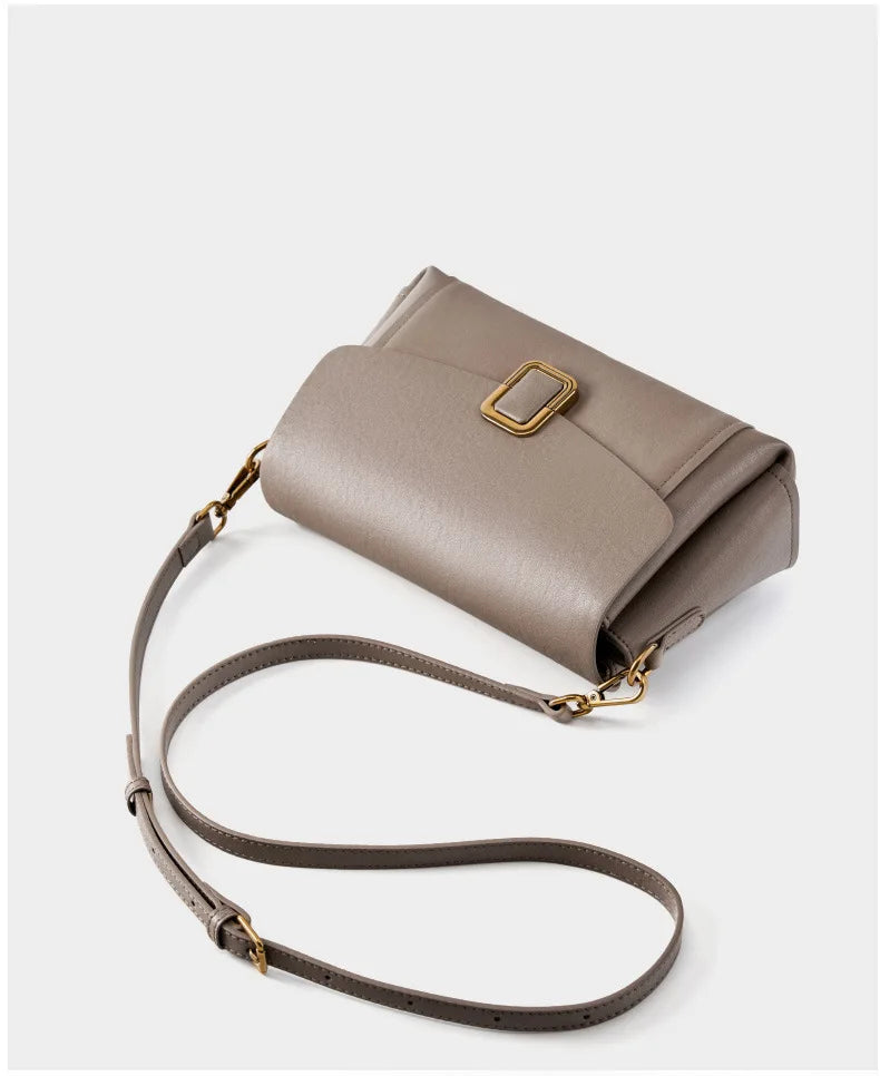 Bolsa feminina portátil de couro genuíno 2025, novo nicho de alta qualidade, bolsa de ombro crossbody, bolsa de viagem feminina com duas alças