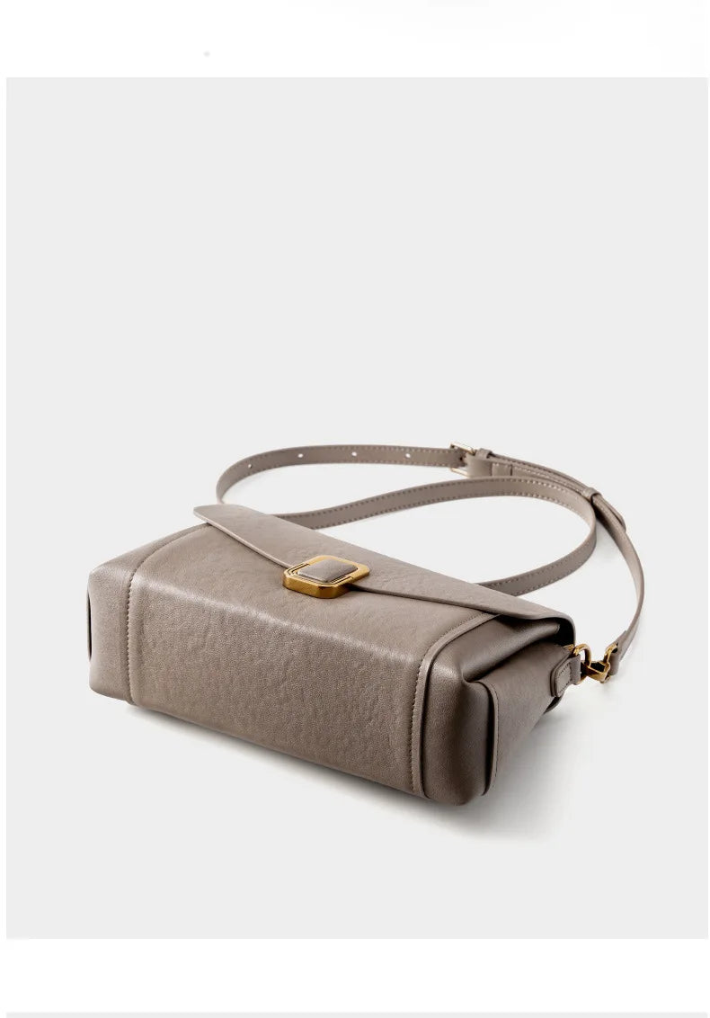 Bolsa feminina portátil de couro genuíno 2025, novo nicho de alta qualidade, bolsa de ombro crossbody, bolsa de viagem feminina com duas alças